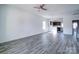 Open-concept living room featuring modern flooring that flows into the kitchen at 554 Geneva Cir, Gastonia, NC 28056