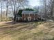 Beautiful two-story brick home featuring a well-maintained lawn and classic architectural details at 610 2Nd Nw Ave, Conover, NC 28613