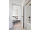 Bathroom featuring a white shower with silver hardware and open doorway to the hall at 6351 Trinity Crossing Cir, Kannapolis, NC 28081