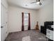 Bedroom featuring carpeted flooring, a window with curtains, and a ceiling fan at 6351 Trinity Crossing Cir, Kannapolis, NC 28081