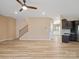 Open living room featuring a staircase, recessed lights, and wood-look floors at 6351 Trinity Crossing Cir, Kannapolis, NC 28081