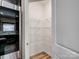 Walk-in pantry features wooden floors and wire shelving providing ample storage space at 6351 Trinity Crossing Cir, Kannapolis, NC 28081