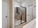 Modern bathroom featuring tiled walk-in shower with seating and mounted shower head at 6351 Trinity Crossing Cir, Kannapolis, NC 28081