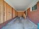 Unfinished carport with storage area at 720 Pleasant Ave, Kannapolis, NC 28081