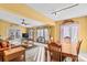 Bright dining room with a wooden table and access to a deck at 906 Harmony Dr, Statesville, NC 28677