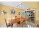 Dining area featuring a wooden table and view into another room at 906 Harmony Dr, Statesville, NC 28677