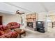 Cozy living room with stone fireplace and built-in shelving at 906 Harmony Dr, Statesville, NC 28677
