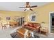Spacious living room featuring a leather sofa and dining area at 906 Harmony Dr, Statesville, NC 28677