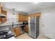 Kitchen featuring stainless steel refrigerator and plenty of cabinet space at 1109 Cherry Meadow Ln, Rock Hill, SC 29732