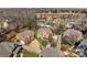 Aerial view of a residential neighborhood with mature trees and well-maintained lawns at 11402 Bloomfield Dr, Charlotte, NC 28277