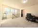 Bright loft area perfect for an office or reading nook at 12712 Wandering Brook Dr, Charlotte, NC 28273