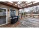 Back deck with wood pergola and outdoor grill at 128 Summerlea Dr, Charlotte, NC 28214