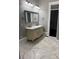 Bathroom with white vanity, double sink and doorway to closet at 135 Waycross Dr, Rockwell, NC 28138