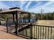 View from gazebo of the deck and above ground pool with slide at 135 Waycross Dr, Rockwell, NC 28138