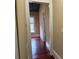 Hallway with high ceilings and wood flooring at 135 Waycross Dr, Rockwell, NC 28138