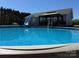 Above ground pool with slide, deck, gazebo, and ladder at 135 Waycross Dr, Rockwell, NC 28138