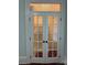 View of a walk-in closet with wire racks and wooden rods viewed through glass French doors at 135 Waycross Dr, Rockwell, NC 28138