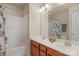 Bathroom featuring double sinks and a shower-tub combination at 14104 Green Birch Dr, Pineville, NC 28134