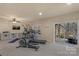 Spacious exercise room with natural light and modern fitness equipment at 14104 Green Birch Dr, Pineville, NC 28134