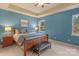 Serene main bedroom with tray ceiling, carpet floors, and natural light at 14104 Green Birch Dr, Pineville, NC 28134