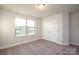 Spacious bedroom with plush carpeting and a double door closet at 166 Swann Rd # 5, Statesville, NC 28625