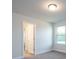 Bright bedroom with window and access to a bathroom at 166 Swann Rd # 5, Statesville, NC 28625