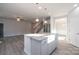 Open concept kitchen with island and stainless steel appliances at 166 Swann Rd # 5, Statesville, NC 28625