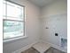 Laundry room with washer and dryer hookups, shelving and window at 166 Swann Rd # 5, Statesville, NC 28625