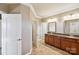 Bathroom featuring double sink vanity, granite counters, and ample storage at 4027 Wiltshire Ln, Indian Land, SC 29707