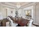 Formal dining room featuring a chandelier, and open access to other areas of the home at 4027 Wiltshire Ln, Indian Land, SC 29707