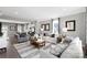 Inviting living room boasts stylish decor, plush seating, and an open view to the kitchen at 434 Serenity Cir # F, Cramerton, NC 28032