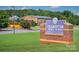 Exterior view of Cramerton Middle School with signage and school bus at 434 Serenity Cir # F, Cramerton, NC 28032