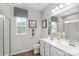 Bathroom featuring a double sink vanity and glass enclosed shower at 437 Serenity Cir # E, Cramerton, NC 28032