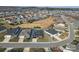 Aerial view of house in a residential area surrounded by trees at 473 Bowline Dr, Denver, NC 28037