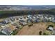 Aerial view of home in a residential neighborhood with trees at 473 Bowline Dr, Denver, NC 28037