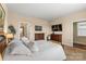 Relaxing bedroom with an en suite bathroom and comforting warm, neutral walls at 473 Bowline Dr, Denver, NC 28037
