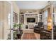 Comfortable living room featuring a built-in entertainment center, leather recliners, and soft natural light at 473 Bowline Dr, Denver, NC 28037