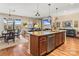 Open concept features kitchen island, dining area and living room with fireplace at 473 Bowline Dr, Denver, NC 28037