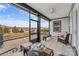 Relaxing screened porch with comfortable seating and views of the backyard at 473 Bowline Dr, Denver, NC 28037