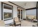 Inviting screened porch with comfortable seating and peaceful outdoor views at 473 Bowline Dr, Denver, NC 28037