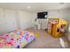 Spacious bedroom featuring a playhouse and tv at 4849 Tacoma Dr, Fort Mill, SC 29707