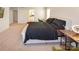 Spacious bedroom boasts carpeted floors and natural light from dual windows at 4849 Tacoma Dr, Fort Mill, SC 29707