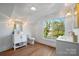 Bathroom with white vanity and large window at 49 8Th Se St, Hickory, NC 28602