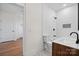 Modern bathroom with subway tile and hexagon floor at 49 8Th Se St, Hickory, NC 28602