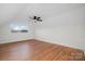Spacious bedroom with hardwood floors and window at 49 8Th Se St, Hickory, NC 28602