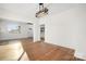 Bright dining room features hardwood floors and a stylish light fixture at 49 8Th Se St, Hickory, NC 28602