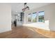 Bright dining room with hardwood floors and modern light fixture at 49 8Th Se St, Hickory, NC 28602