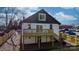 Back exterior of renovated home with deck and fenced yard at 49 8Th Se St, Hickory, NC 28602