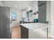 Modern kitchen with white quartz countertops and stainless steel appliances at 49 8Th Se St, Hickory, NC 28602