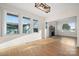 Spacious living room with hardwood floors, fireplace and large windows at 49 8Th Se St, Hickory, NC 28602